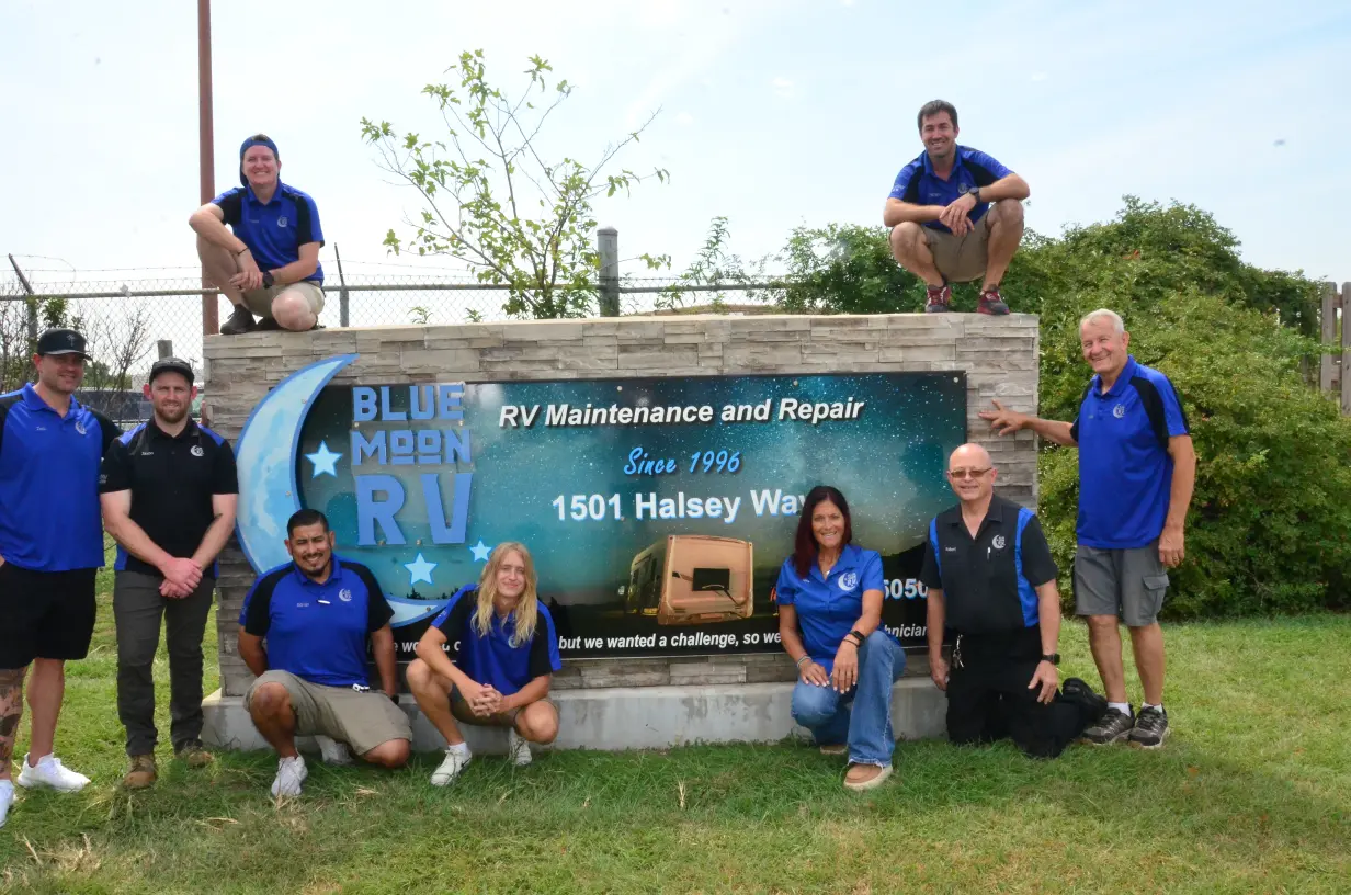 Blue Moon RV team at front sign